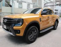 2024 FORD RANGER DOUBBLE CAB 2.0 TURBO WILDTRAK เกียร์ธรรมดา สีเหลือง  วิ่งน้อย 15,357 กม. รถสวยใหม่