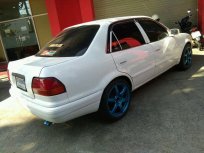 รถ corolla AE111 สีขาว เครื่อง 1600 เกียร์ธรรมดา ล้อ 17 จูน E85