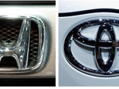 เทคโนโลยีรถยนต์แข่งเดือด ทำ "Toyota-Honda" ปรับลดกำไร 