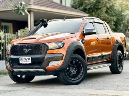 Ford ranger wildtrak 3.2 4WD  เครื่องยนต์: ดีเซล เกียร์: ออโต้  ปี: 2018 สี: ส้ม