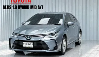 เบนซิน-ไฟฟ้า  Toyota Corolla Altis Hybrid Mid รถเก๋ง 4 ประตู
