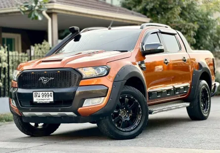 Ford ranger wildtrak 3.2 4WD  เครื่องยนต์: ดีเซล เกียร์: ออโต้  ปี: 2018 สี: ส้ม