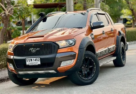 Ford ranger wildtrak 3.2 4WD  เครื่องยนต์: ดีเซล เกียร์: ออโต้  ปี: 2018 สี: ส้ม