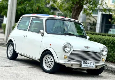 Mini Rover 1.3i  เครื่องยนต์: เบนซิน เกียร์: ธรรมดา ปี: 1998 สี: ขาว